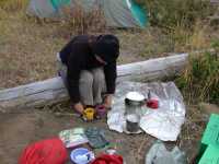 Lynde warming her toes with hot cups of tea and cider