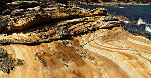 Honeycombed Painted Cliffs